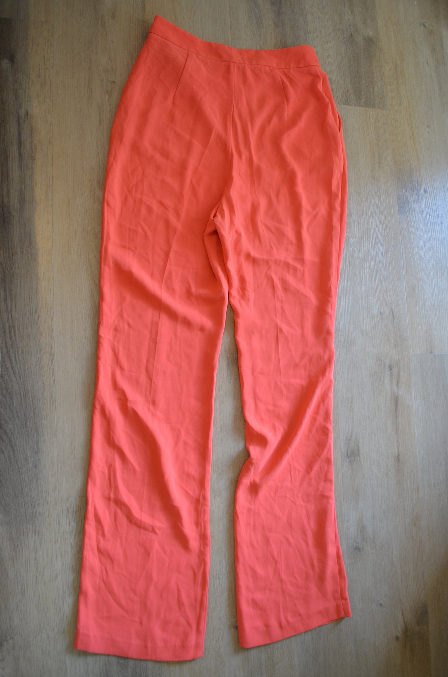 Orange pants with buckle